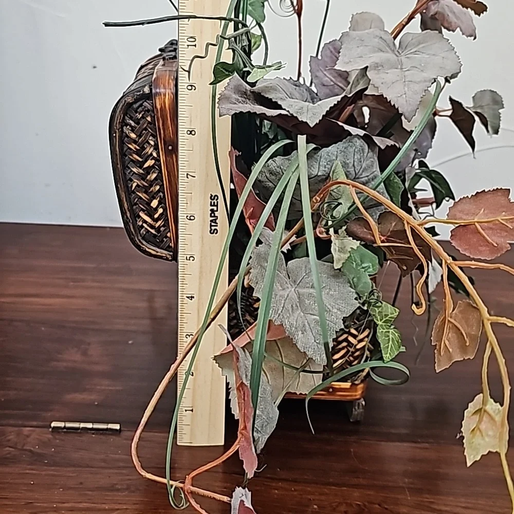 Vintage faux plant in wooden chest box decoration